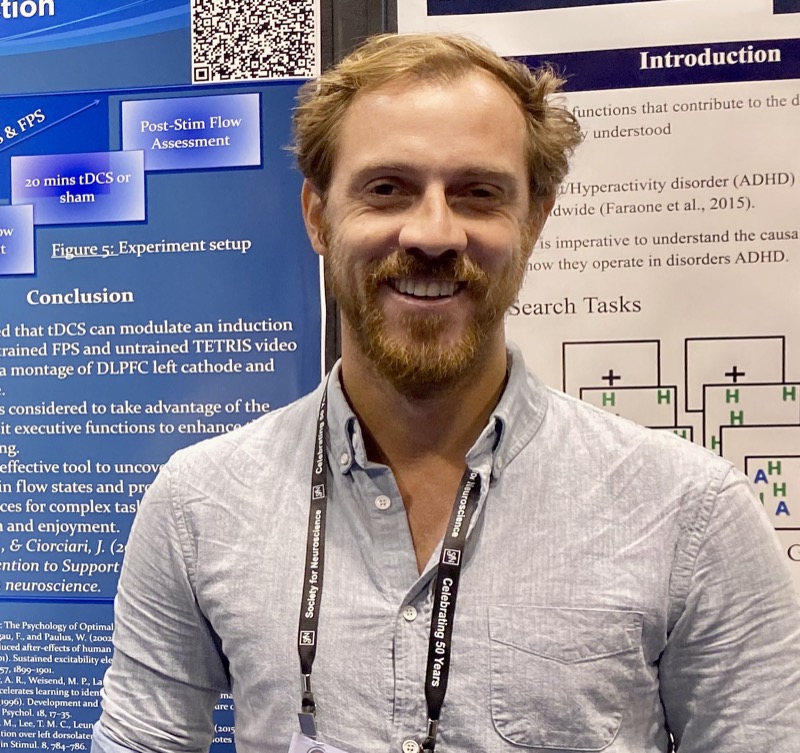 Josh, founder of Scam SafeGuard, presenting neuroscience research at a Society for Neuroscience conference